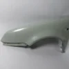 VOLKSWAGEN BORA- 99/05; ÖN ÇAMURLUK DELİKLİ SOL GRİ BOYALI (SIMYI) 1J5821021