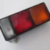 MITSUBISHI CANTER- FE304- 90/97; STOP LAMBASI SAĞ (SARI/KIRMIZI/BEYAZ) (KÜÇÜK TİP) (FAMELLA) MB098056